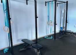 Two wall mounted squat racks in PLW Fitness Studio Darlington